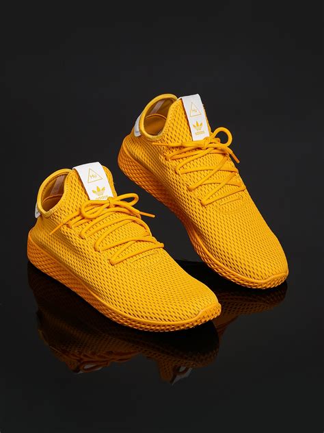 adidas yellow sneakers.